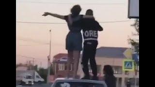 С риском для жизни прокатились на крыше автомобиля молодые люди