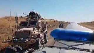 Russian military police and US road pirate in Syria. 